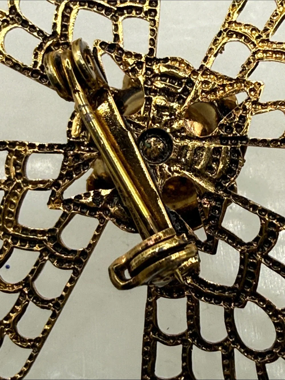 Gold Filigree Floral Brooch with Clear Crystal Center
